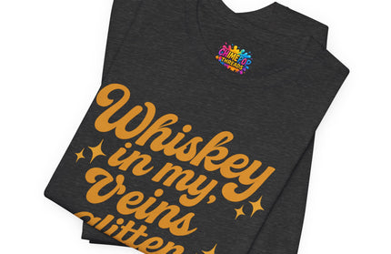 WHISKEY IN MY EYES, GLITTER IN MY VEINS GRAPHIC TEE