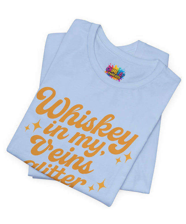 WHISKEY IN MY EYES, GLITTER IN MY VEINS GRAPHIC TEE