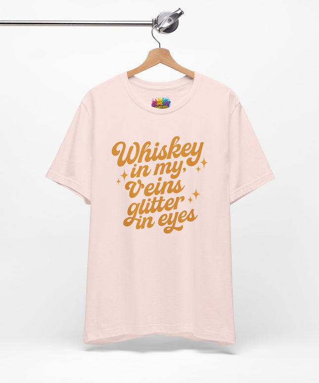 WHISKEY IN MY EYES, GLITTER IN MY VEINS GRAPHIC TEE