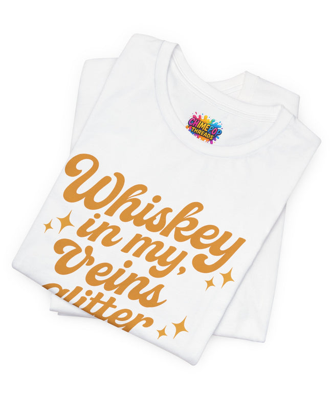 WHISKEY IN MY EYES, GLITTER IN MY VEINS GRAPHIC TEE