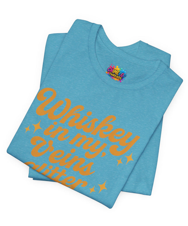 WHISKEY IN MY EYES, GLITTER IN MY VEINS GRAPHIC TEE
