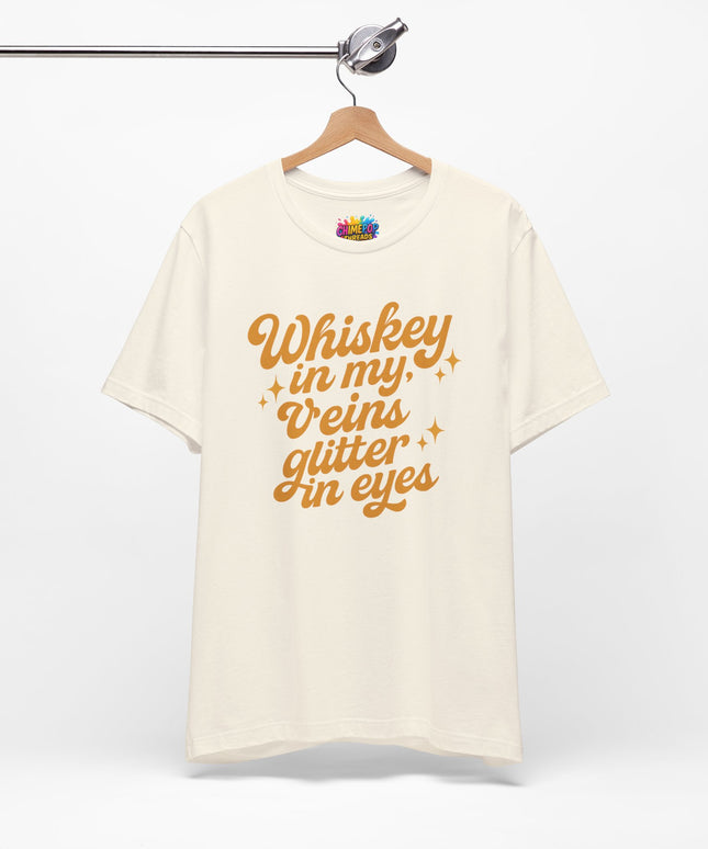 WHISKEY IN MY EYES, GLITTER IN MY VEINS GRAPHIC TEE